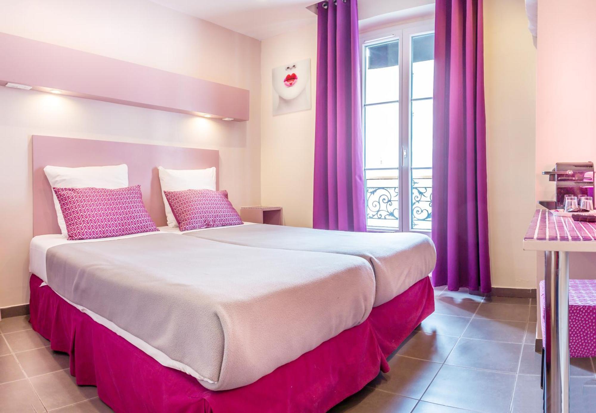 Hotel La Petite Rosa Paris Bilik gambar
